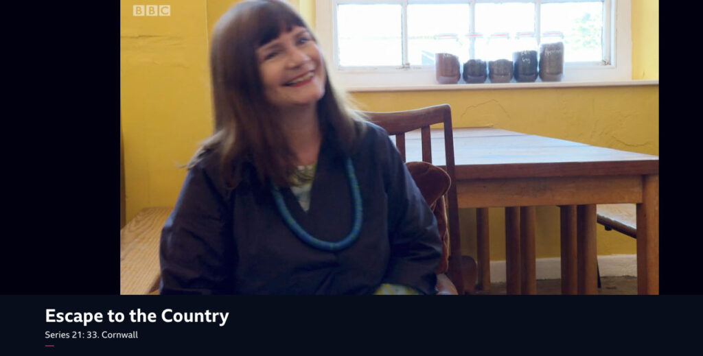 Alison Bick smiling whilst chatting on the Escape to the Country Cornwall episode.